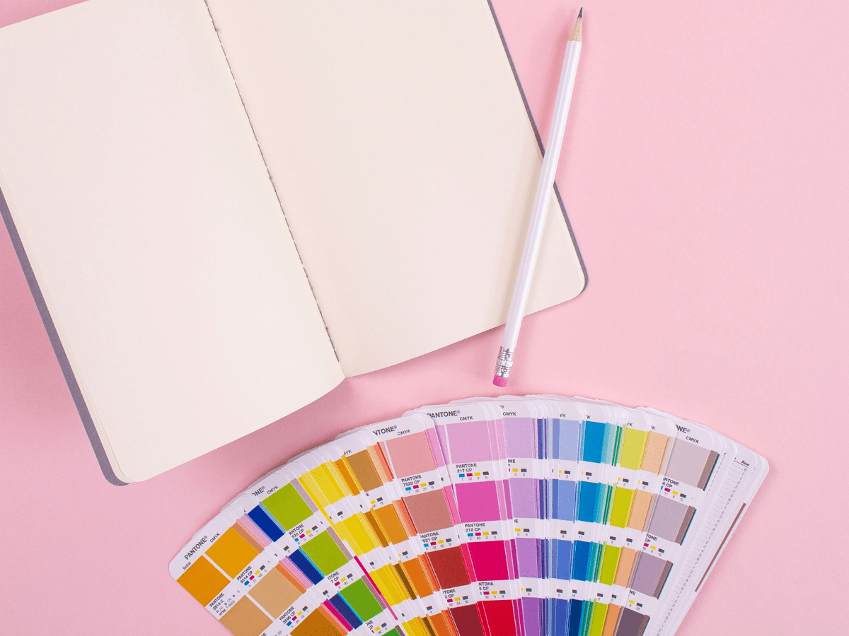 power of branding, blank notebook and paint swatches